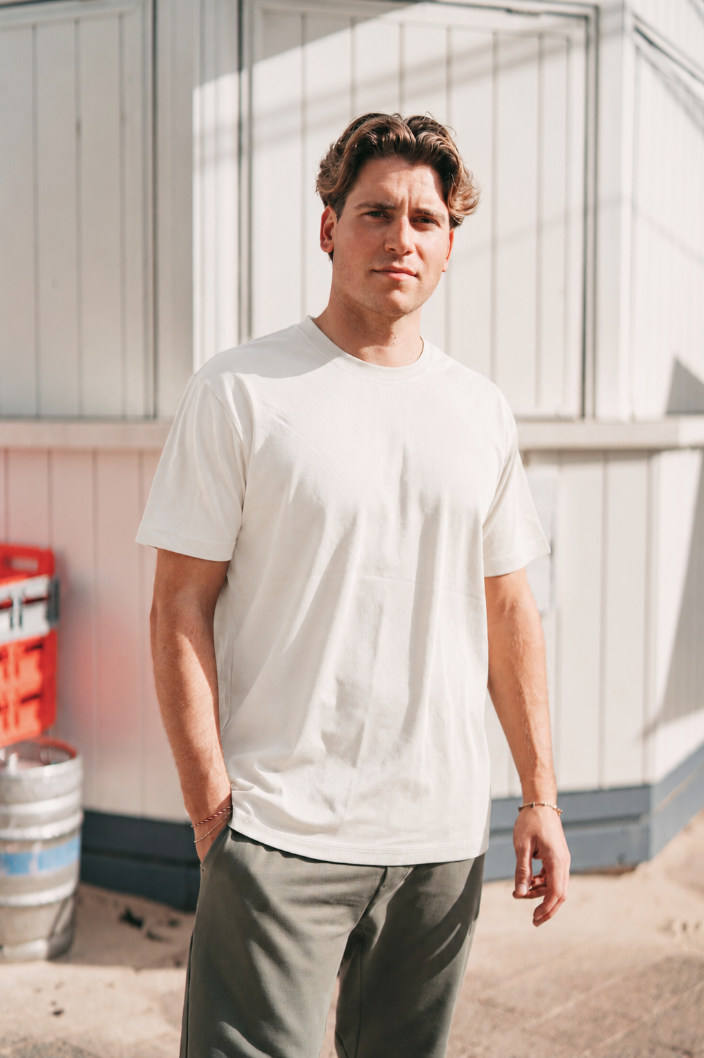 White Premium Heavyweight Cotton T-Shirt full body front view on model, showing overall fit and length